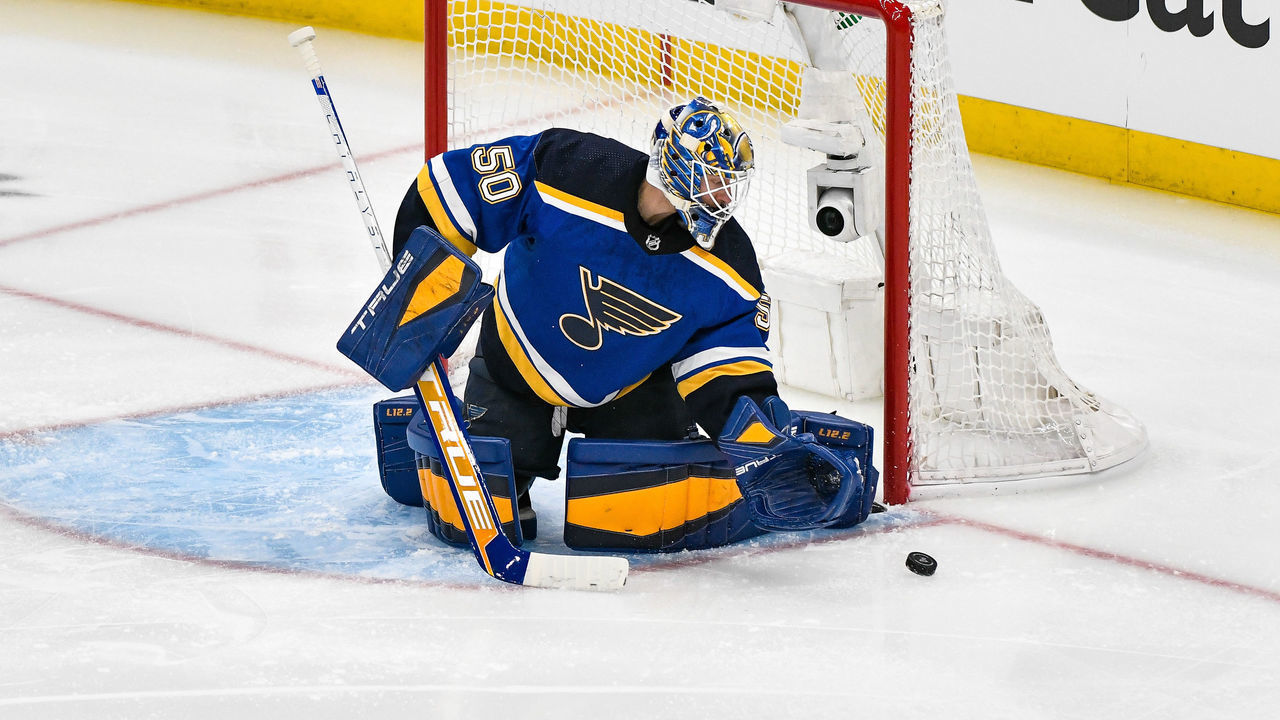 ST. LOUIS, MO - MAY 21: St. Louis Blues goaltender Jordan Binnington (50) makes a save during Round 2 game 3 of the Stanley Cup Playoffs between the Colorado Avalanche and the St. Louis Blues on May 21, 2022, at the Enterprise Center in St. Louis MO