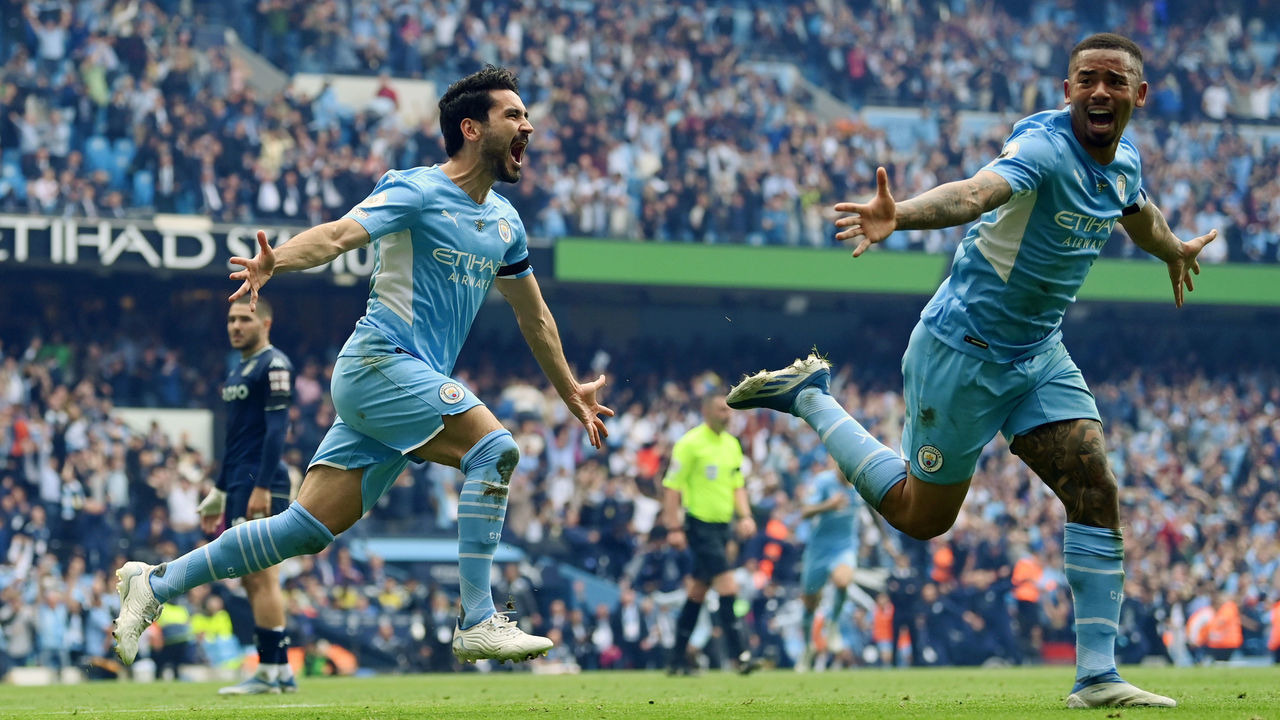 MANCHESTER, ENGLAND - MAY 22: Ilkay Guendogan of Manchester City celebrates after scoring their team's third goal during the Premier League match between Manchester City and Aston Villa at Etihad Stadium on May 22, 2022 in Manchester, England.