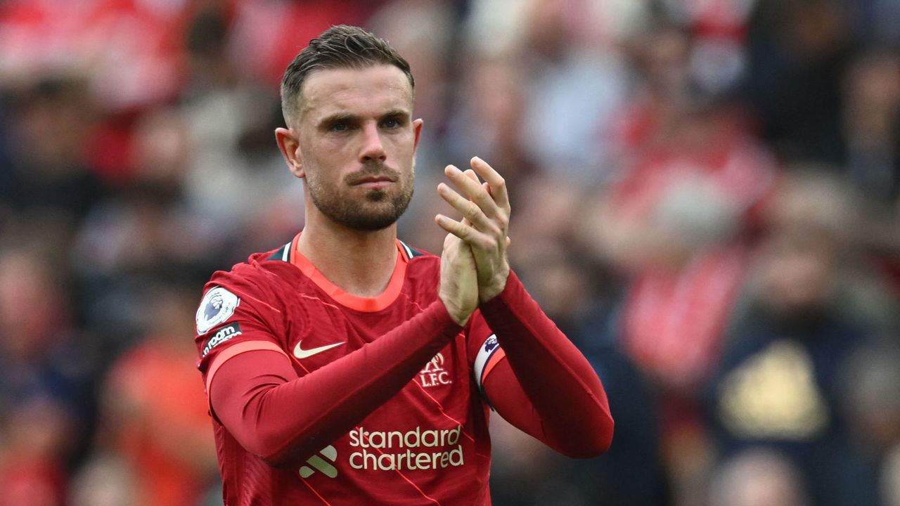 Liverpool's English midfielder Jordan Henderson reacts at the end of the English Premier League football match between Liverpool and Wolverhampton Wanderers at Anfield in Liverpool, north west England on May 22, 2022. - Liverpool didn't win the Premier League football title. - RESTRICTED TO EDITORIAL USE. No use with unauthorized audio, video, data, fixture lists, club/league logos or 'live' services. Online in-match use limited to 120 images. An additional 40 images may be used in extra time. No video emulation. Social media in-match use limited to 120 images. An additional 40 images may be used in extra time. No use in betting publications, games or single club/league/player publications.