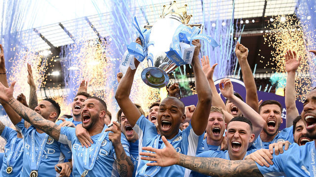 MANCHESTER, ENGLAND - MAY 22: Fernandinho of Manchester City lifts the Premier League trophy after their side finished the season as Premier League champions during the Premier League match between Manchester City and Aston Villa at Etihad Stadium on May 22, 2022 in Manchester, England.