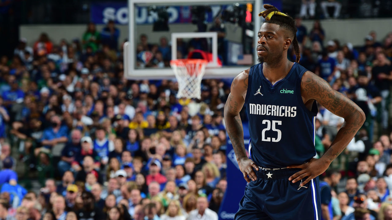 DALLAS, TX - May 22: Reggie Bullock #25 of the Dallas Mavericks looks on during Game 3 of the 2022 NBA Playoffs Western Conference Finals on MAY 22, 2022 at the American Airlines Center in Dallas, Texas. Mandatory Copyright Notice: Copyright 2022 NBAE