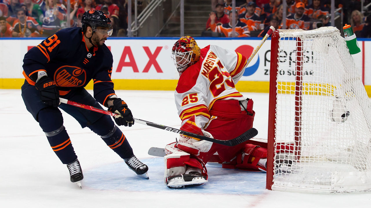 EDMONTON, AB - MAY 22: Evander Kane #91 of the Edmonton Oilers scores his third of the evening against goaltender Jacob Markstrom #25 of the Calgary Flames during the second period in Game Three of the Second Round of the 2022 Stanley Cup Playoffs at Rogers Place on May 22, 2022 in Edmonton, Canada.