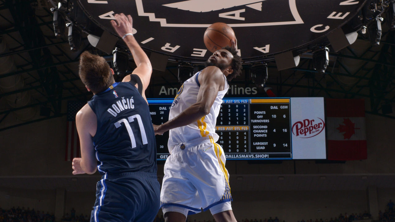 DALLAS, TX - MAY 22: Andrew Wiggins #22 of the Golden State Warriors dunks the ball during Game 3 of the 2022 NBA Playoffs Western Conference Finals against the Dallas Mavericks on May 22, 2022 at the American Airlines Center in Dallas, Texas. Mandatory Copyright Notice: Copyright 2022 NBAE