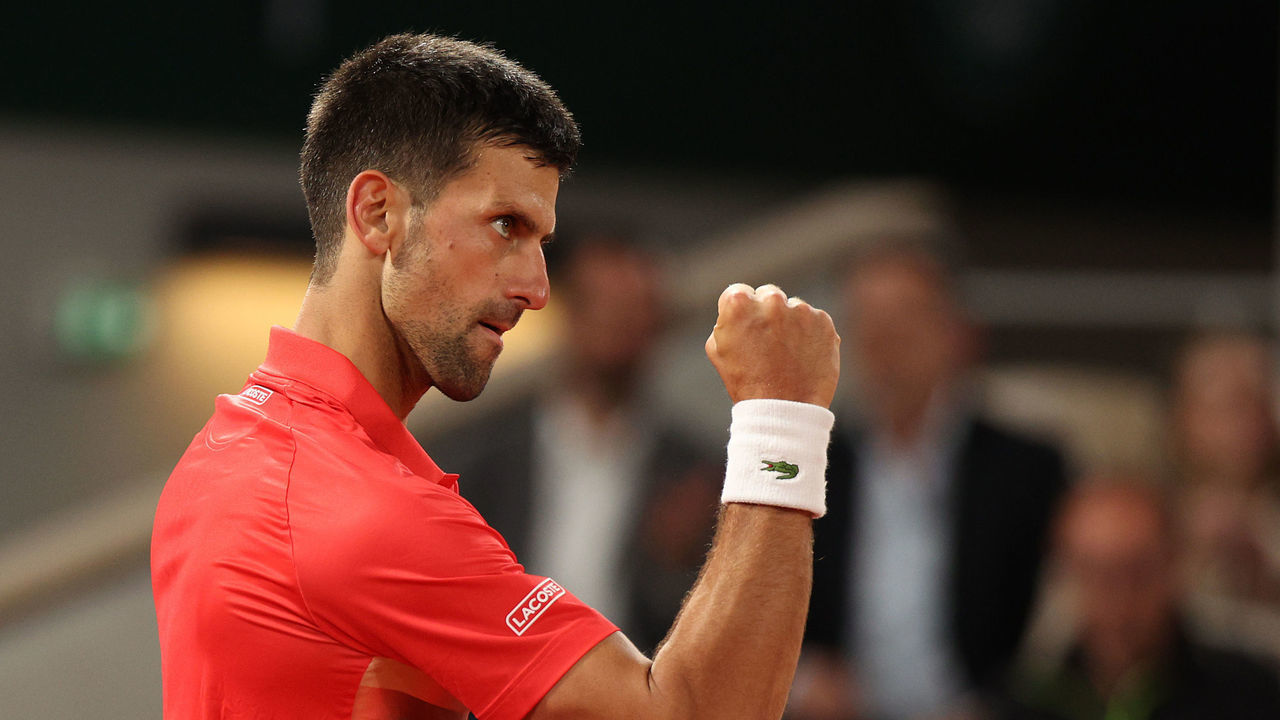 PARIS, FRANCE - MAY 23: Novak Djokovic of Serbia celebrates winning a point against Yoshihito Nishioka of Japan during the Men's Singles First Round match at Roland Garros on May 23, 2022 in Paris, France.
