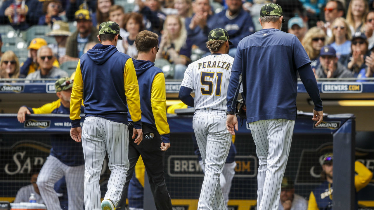 MILWAUKEE, WI - MAY 22: Milwaukee Brewers starting pitcher Freddy Peralta (51) leaves with an injury in the fourth inning during a game between the Milwaukee Brewers and the Washington Nationals on May 22, 2022, at American Family Field in Milwaukee, WI.