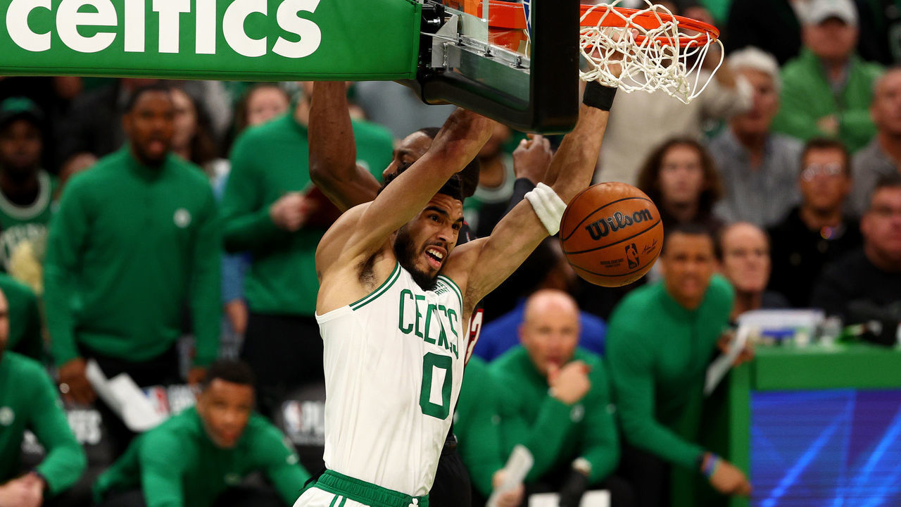 BOSTON, MASSACHUSETTS - MAY 23: Jayson Tatum #0 of the Boston Celtics dunks the ball against Bam Adebayo #13 of the Miami Heat during the first quarter in Game Four of the 2022 NBA Playoffs Eastern Conference Finals at TD Garden on May 23, 2022 in Boston, Massachusetts.