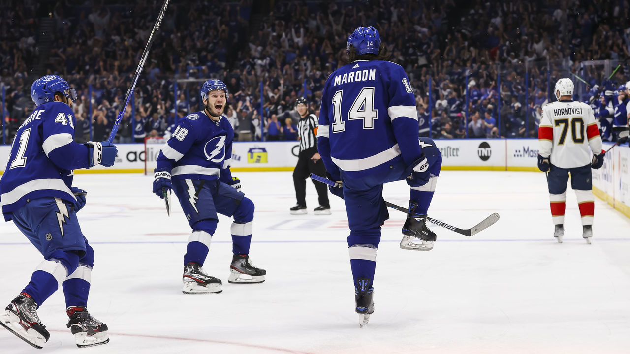 TAMPA, FL - MAY 23: Pat Maroon #14 of the Tampa Bay Lightning celebrates a goal with teammate Mikhail Sergachev #98 against the Florida Panthers during the third period in Game Four of the Second Round of the 2022 Stanley Cup Playoffs at Amalie Arena on May 23, 2022 in Tampa, Florida.