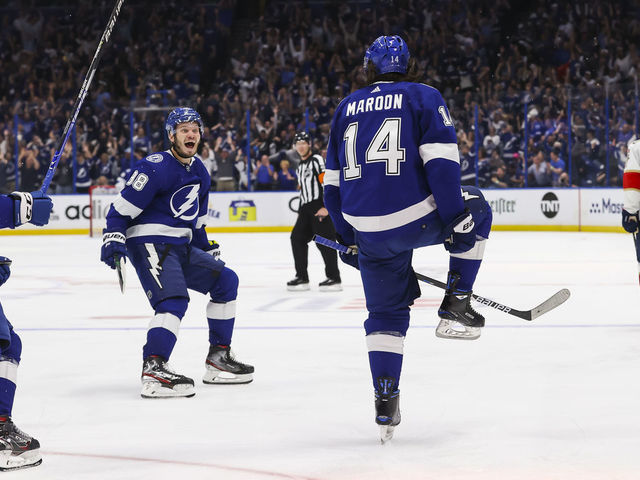 TAMPA, FL - MAY 23: Pat Maroon #14 of the Tampa Bay Lightning celebrates a goal with teammate Mikhail Sergachev #98 against the Florida Panthers during the third period in Game Four of the Second Round of the 2022 Stanley Cup Playoffs at Amalie Arena on May 23, 2022 in Tampa, Florida.
