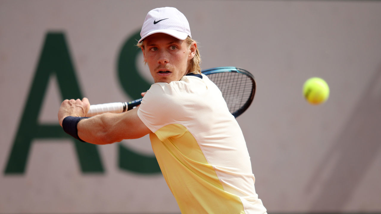 PARIS, FRANCE - MAY 24: Denis Shapovalov of Canada plays a backhand against Holger Rune of Denmark during the Men's Singles First Round match on Day 3 of the French Open at Roland Garros on May 24, 2022 in Paris, France.