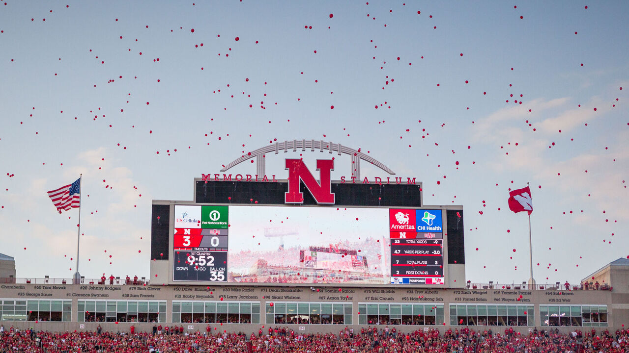 LINCOLN, NE - SEPTEMBER 02: Nebraska Cornhusker fans release red balloons after the first score against the Arkansas State Red Wolves during the first half on September 02, 2017 at Memorial Stadium in Lincoln, Nebraska. Nebraska beat Arkansas State 43 to 36.