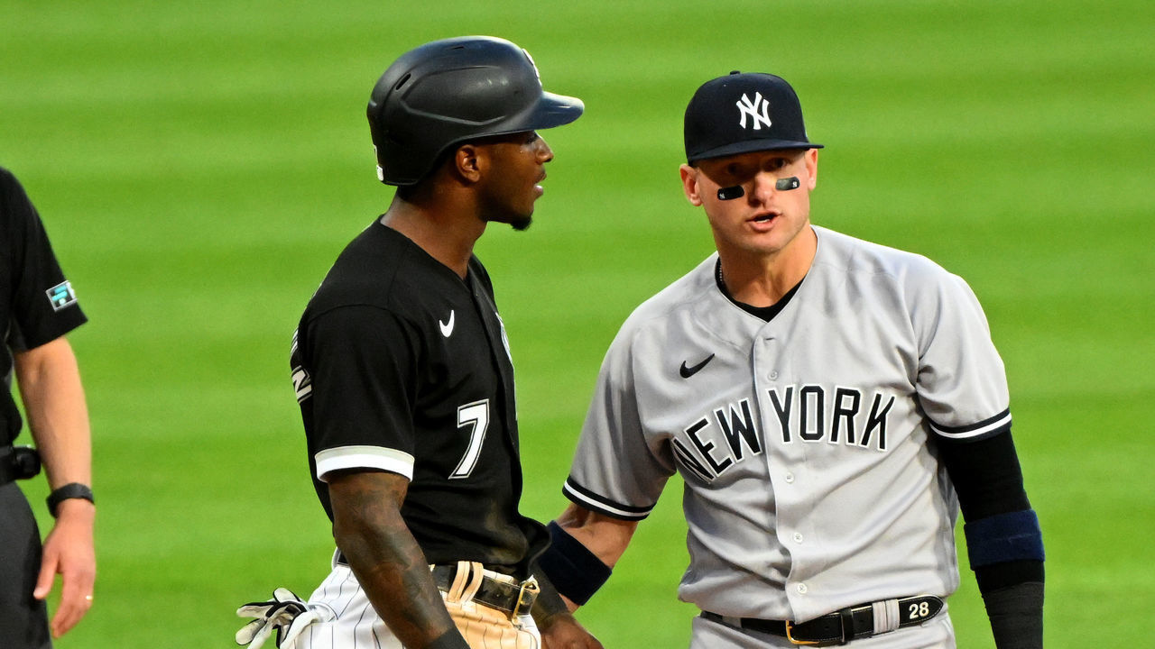 CHICAGO - MAY 13: Josh Donaldson #28 of the the New York Yankees exchanges words with Tim Anderson #7 of the Chicago White Sox after Donaldson unsuccessfully attempted to keep Anderson from reaching third base in the first inning on May 13, 2022 at Guaranteed Rate Field in Chicago, Illinois.