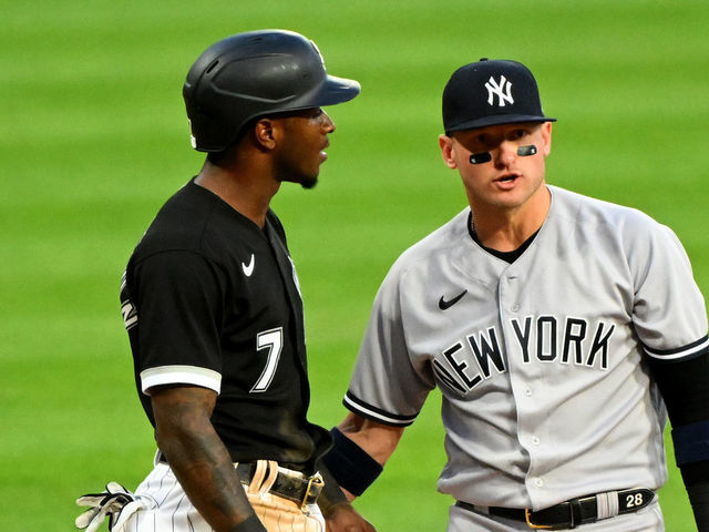 CHICAGO - MAY 13: Josh Donaldson #28 of the the New York Yankees exchanges words with Tim Anderson #7 of the Chicago White Sox after Donaldson unsuccessfully attempted to keep Anderson from reaching third base in the first inning on May 13, 2022 at Guaranteed Rate Field in Chicago, Illinois.