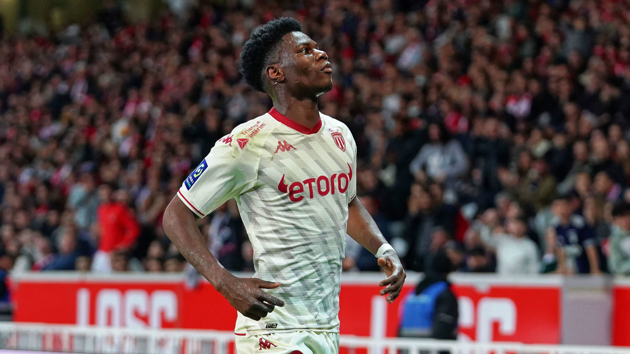 LILLE, FRANCE - MAY 06: Aurelien Tchouameni of AS Monaco celebrates after scoring his team's 2nd goal during the Ligue 1 Uber Eats match between Lille OSC and AS Monaco at Stade Pierre Mauroy on May 6, 2022 in Lille, France.