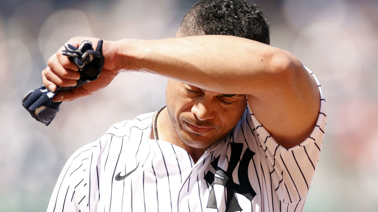 NEW YORK, NEW YORK - MAY 21: Giancarlo Stanton #27 of the New York Yankees reacts after hitting a single during the fifth inning against the Chicago White Sox at Yankee Stadium on May 21, 2022 in the Bronx borough of New York City.
