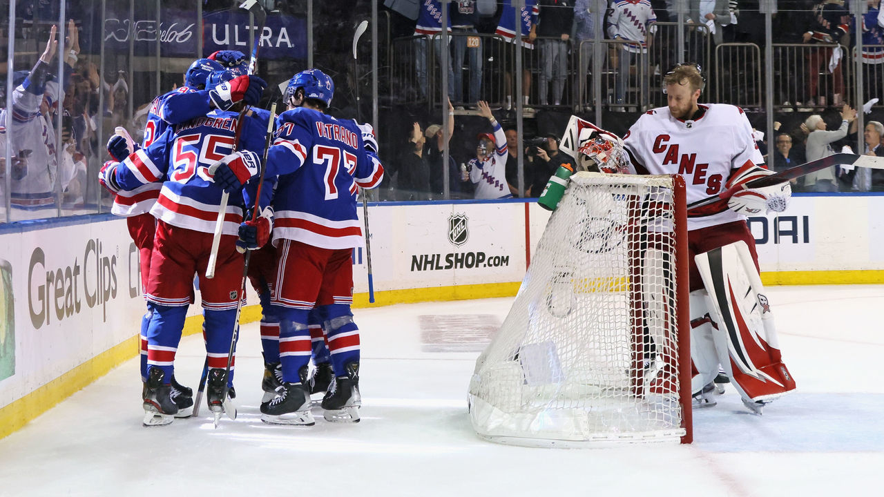 NEW YORK, NEW YORK - MAY 24: The New York Rangers celebrate a second period goal by Mika Zibanejad #93 against Antti Raanta #32 of the Carolina Hurricanes in Game Four of the Second Round of the 2022 Stanley Cup Playoffs at Madison Square Garden on May 24, 2022 in New York City.