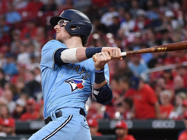 Toronto Blue Jays' Danny Jensen (9) hits a single during second inning AL  MLB baseball action against the Boston Red Sox, in Toronto on Saturday  October 1, 2022. THE CANADIAN PRESS/Christopher Katsarov