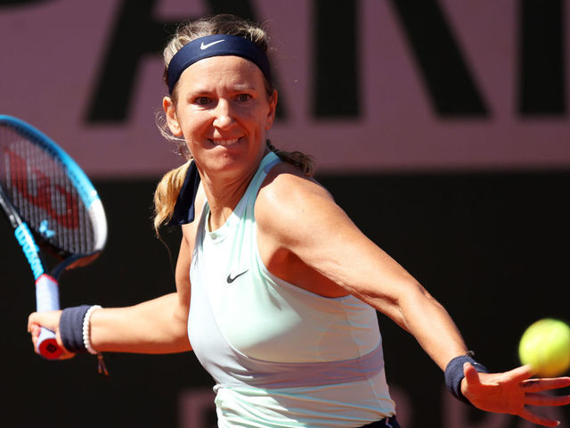 PARIS, FRANCE - MAY 25: Victoria Azarenka of Belarus plays a forehand against Andrea Petkovic of Germany during the Women's Singles Round 2 on Day Four of The 2022 French Open at Roland Garros on May 25, 2022 in Paris, France.