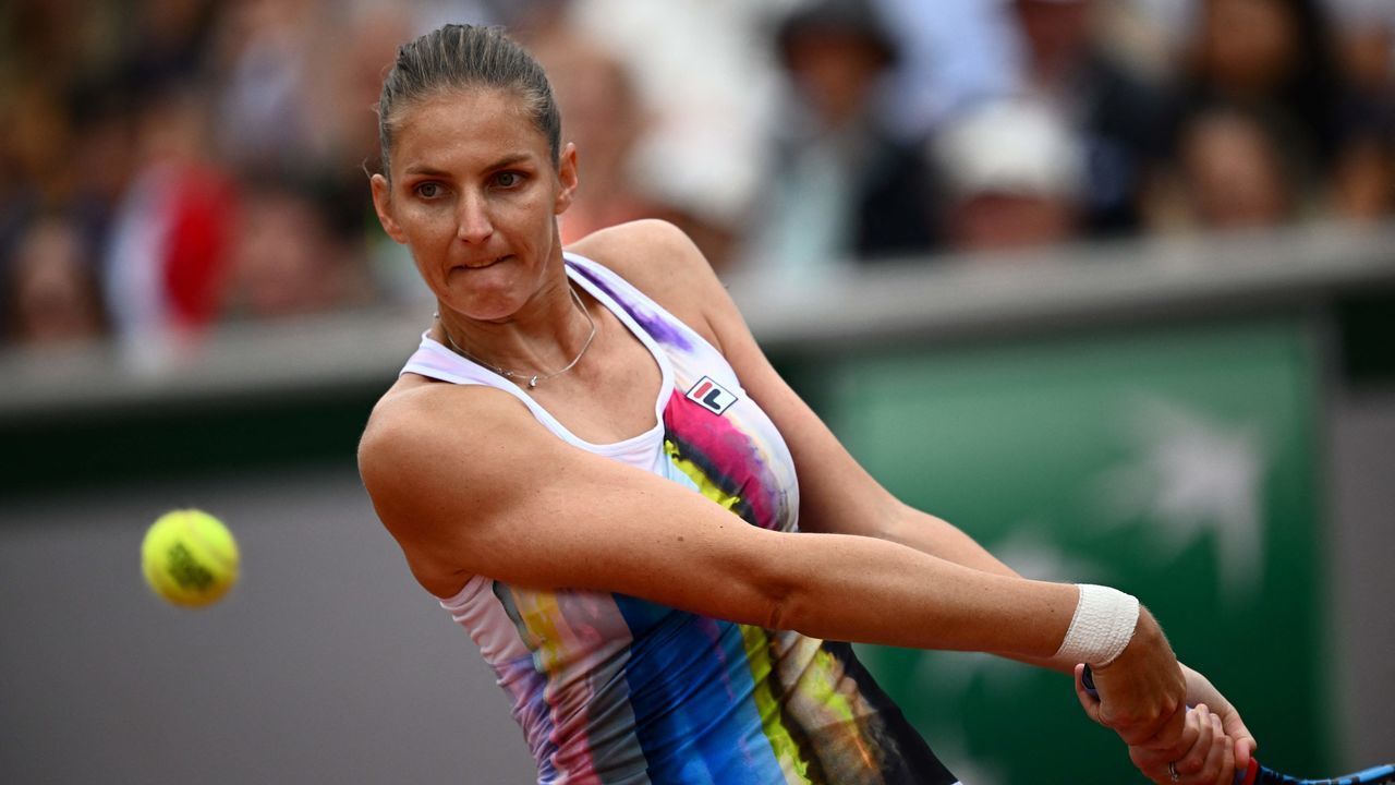 Czech Republic's Karolina Pliskova plays a backhand return to France's Leolia Jeanjean during their women's singles match on day five of the Roland-Garros Open tennis tournament at the Court Simonne-Mathieu in Paris on May 26, 2022.