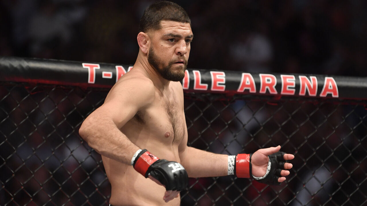 LAS VEGAS, NEVADA - SEPTEMBER 25: Nick Diaz enters the Octagon in his middleweight fight during the UFC 266 event on September 25, 2021 in Las Vegas, Nevada.