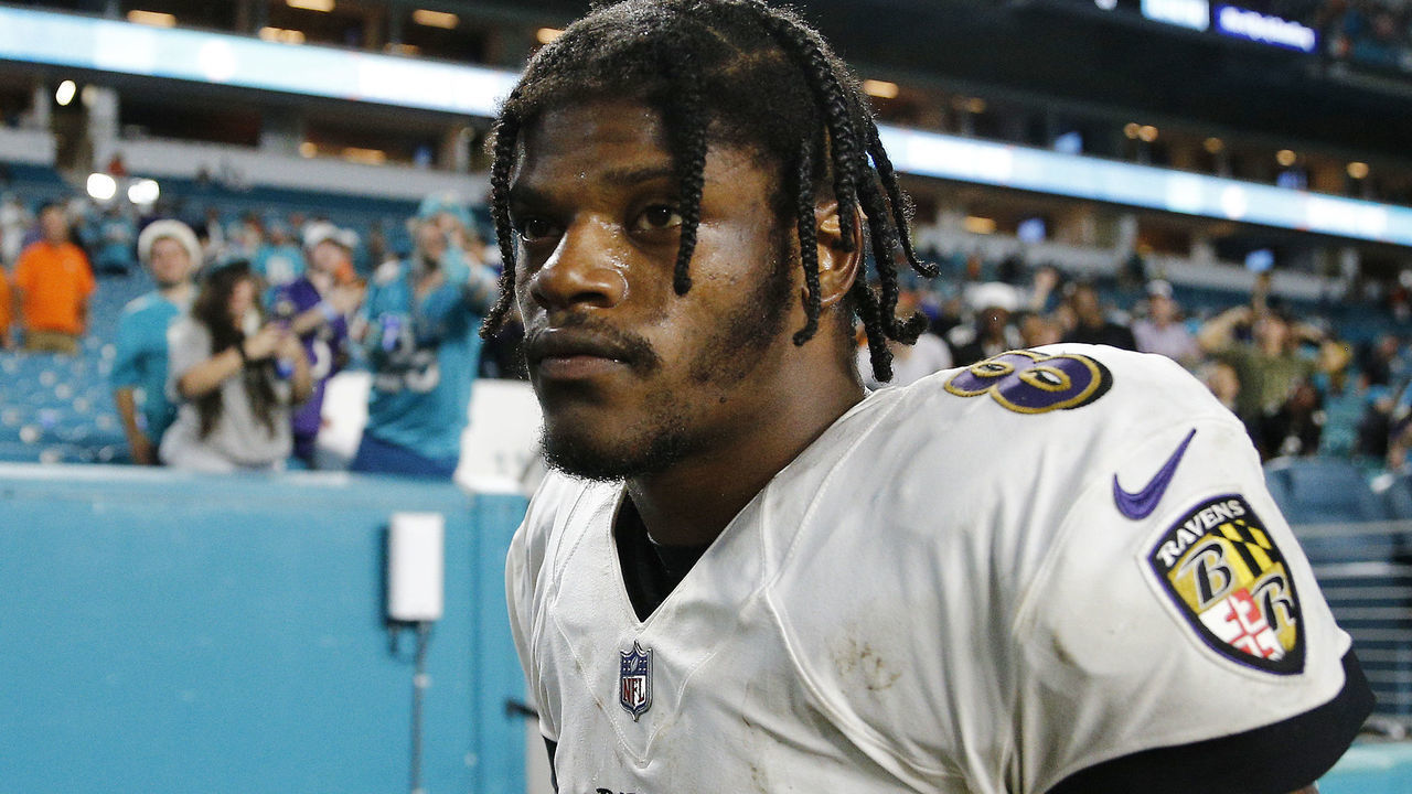 MIAMI GARDENS, FLORIDA - NOVEMBER 11: Lamar Jackson #8 of the Baltimore Ravens reacts after losing to the Miami Dolphins 22-10 at Hard Rock Stadium on November 11, 2021 in Miami Gardens, Florida.