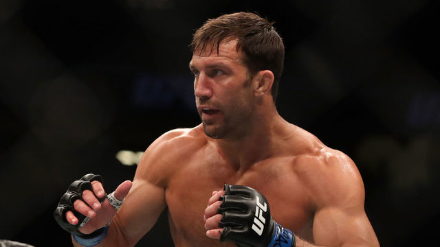 LAS VEGAS, NV - JULY 06: Luke Rockhold pressures Jan Blachowicz of Poland in their light heavyweight fight during the UFC 239 event at T-Mobile Arena on July 6, 2019 in Las Vegas, Nevada.