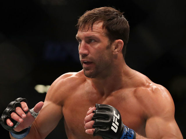 LAS VEGAS, NV - JULY 06: Luke Rockhold pressures Jan Blachowicz of Poland in their light heavyweight fight during the UFC 239 event at T-Mobile Arena on July 6, 2019 in Las Vegas, Nevada.