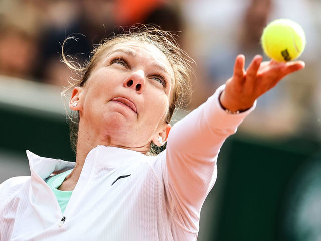 PARIS, FRANCE - MAY 26: Simona Halep of Romania serves in the Women's singles Second Round match against Zheng Qinwen of China during Day Five of the 2022 French Open at Roland Garros on May 26, 2022 in Paris, France.