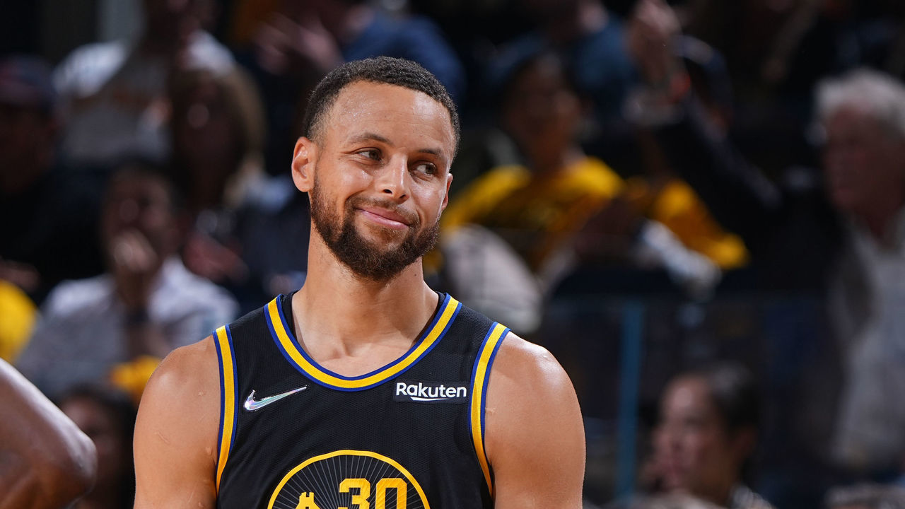 SAN FRANCISCO, CA - MAY 26: Stephen Curry #30 of the Golden State Warriors and Luka Doncic #77 of the Dallas Mavericks look on during Game 5 of the 2022 NBA Playoffs Western Conference Finals on May 26, 2022 at Chase Center in San Francisco, California. NOTE TO USER: User expressly acknowledges and agrees that, by downloading and or using this photograph, user is consenting to the terms and conditions of Getty Images License Agreement. Mandatory Copyright Notice: Copyright 2022 NBAE