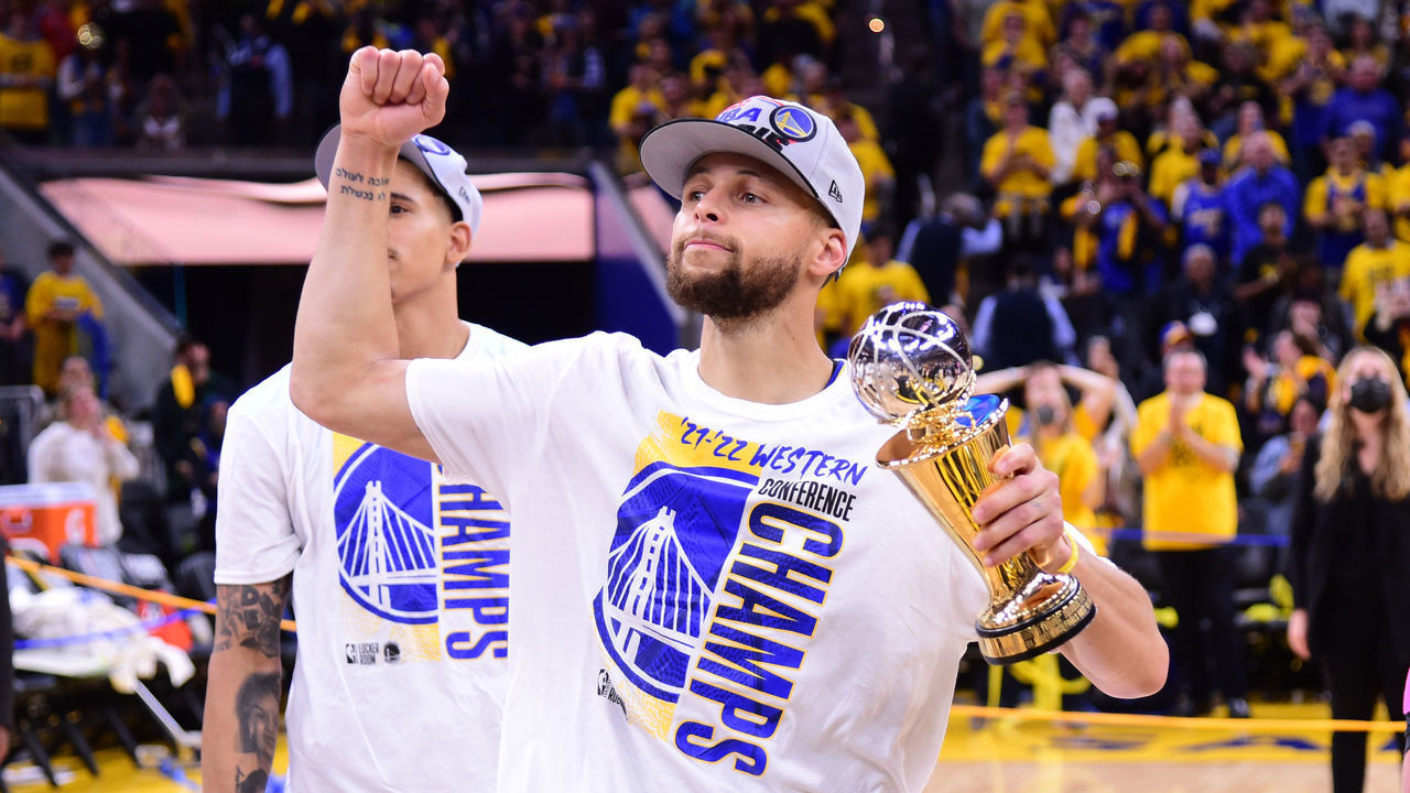 SAN FRANCISCO, CA - MAY 26: Stephen Curry #30 of the Golden State Warriors celebrates after winning the Magic Johnson Western Conference Finals MVP award after Game 5 of the 2022 NBA Playoffs Western Conference Finals on March 26, 2022 at Chase Center in San Francisco, California. NOTE TO USER: User expressly acknowledges and agrees that, by downloading and or using this photograph, user is consenting to the terms and conditions of Getty Images License Agreement. Mandatory Copyright Notice: Copyright 2022 NBAE