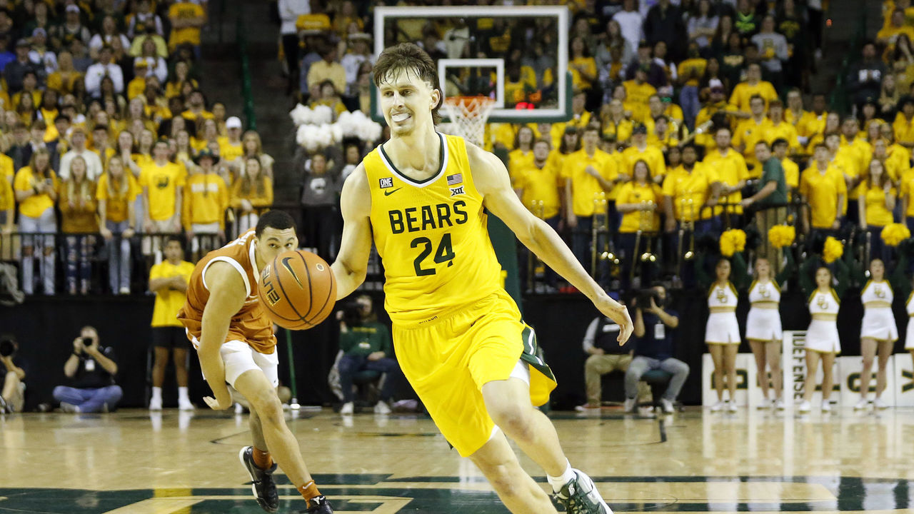 WACO, TX - FEBRUARY 12: Baylor University Bear forward Matthew Mayer dribbles up the court during the game against the University of Texas Longhorns at the Ferrell Center in Waco, TX on February 12, 2022.