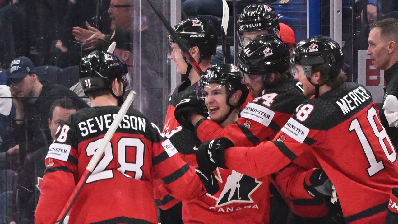 Canada's forward Matt Barzal (C) celebrates with teammates scoring his team's fourth goal during the IIHF Ice Hockey World Championships half final match between Canada and Czech Republic in Tampere, Finland, on May 28, 2022.