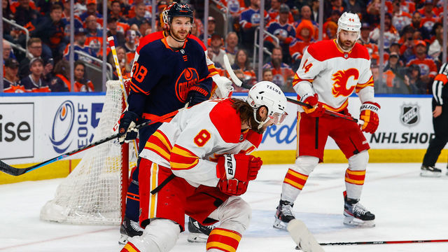 EDMONTON, AB - MAY 24: Calgary Flames Defenceman Christopher Tanev (8) re injures himself in the first period during the Edmonton Oilers versus the Calgary Flames in the Stanley Cup playoffs round 2, game 4 on May 24, 2022 at Rogers Place in Edmonton, AB.