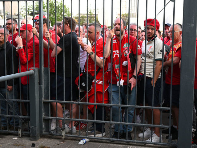 PARIS, FRANCE - MAY 28: Liverpool fans are seen queuing outside the stadium prior to the UEFA Champions League final match between Liverpool FC and Real Madrid at Stade de France on May 28, 2022 in Paris, France.