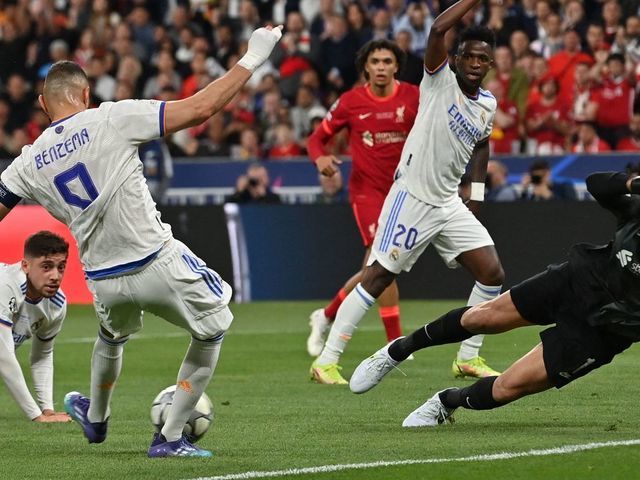 Real Madrid's French striker Karim Benzema shoots but the goal is offside during the UEFA Champions League final football match between Liverpool and Real Madrid at the Stade de France in Saint-Denis, north of Paris, on May 28, 2022.