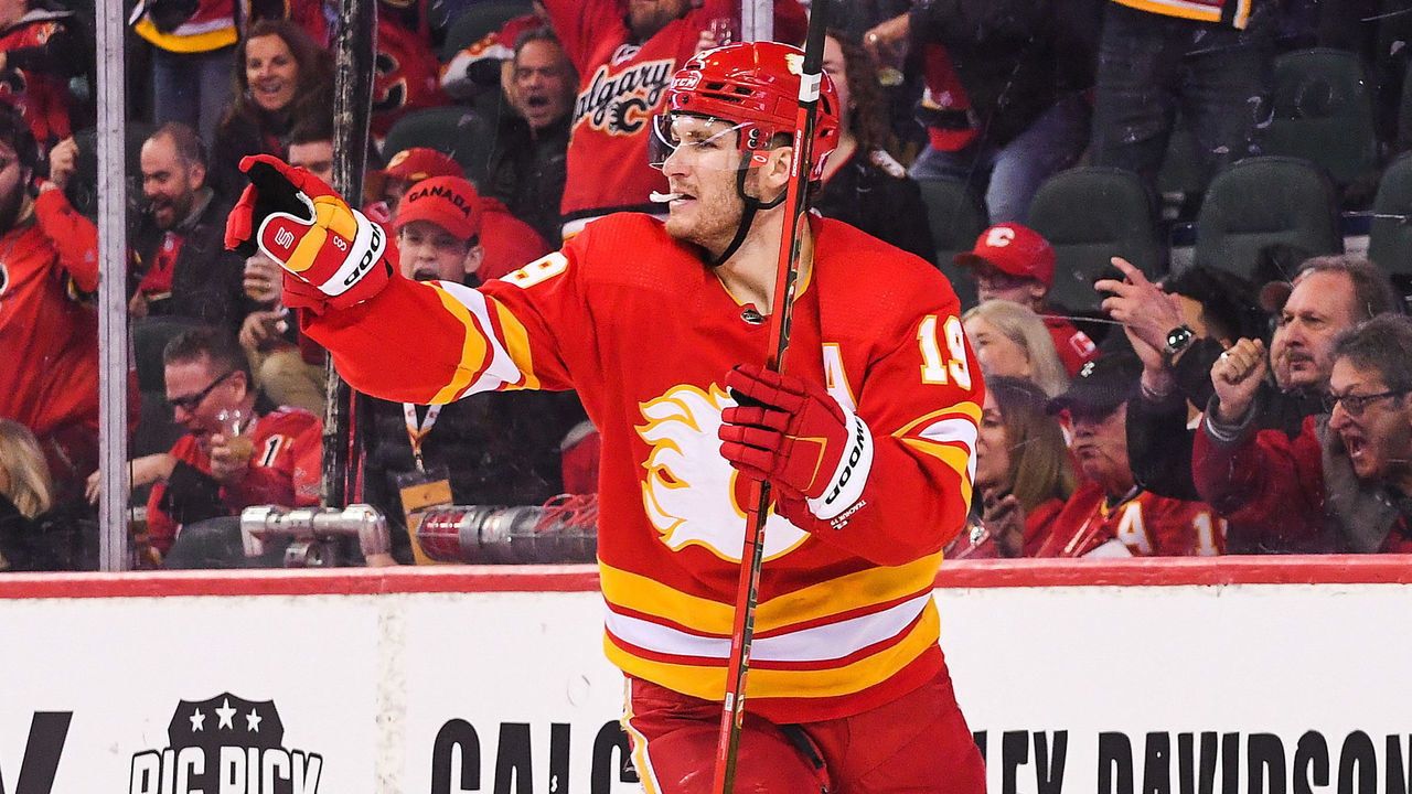CALGARY, AB - APRIL 12: Matthew Tkachuk #19 of the Calgary Flames celebrates after scoring against the Seattle Kraken during the third period of an NHL game at Scotiabank Saddledome on April 12, 2022 in Calgary, Alberta, Canada.