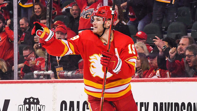 CALGARY, AB - APRIL 12: Matthew Tkachuk #19 of the Calgary Flames celebrates after scoring against the Seattle Kraken during the third period of an NHL game at Scotiabank Saddledome on April 12, 2022 in Calgary, Alberta, Canada.