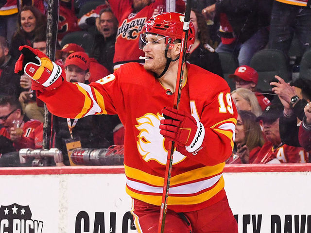 CALGARY, AB - APRIL 12: Matthew Tkachuk #19 of the Calgary Flames celebrates after scoring against the Seattle Kraken during the third period of an NHL game at Scotiabank Saddledome on April 12, 2022 in Calgary, Alberta, Canada.