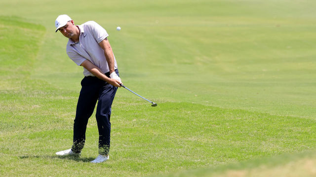 FORT WORTH, TEXAS - MAY 28: Scottie Scheffler of the United States plays a shot on the second hole during the third round of the Charles Schwab Challenge at Colonial Country Club on May 28, 2022 in Fort Worth, Texas.