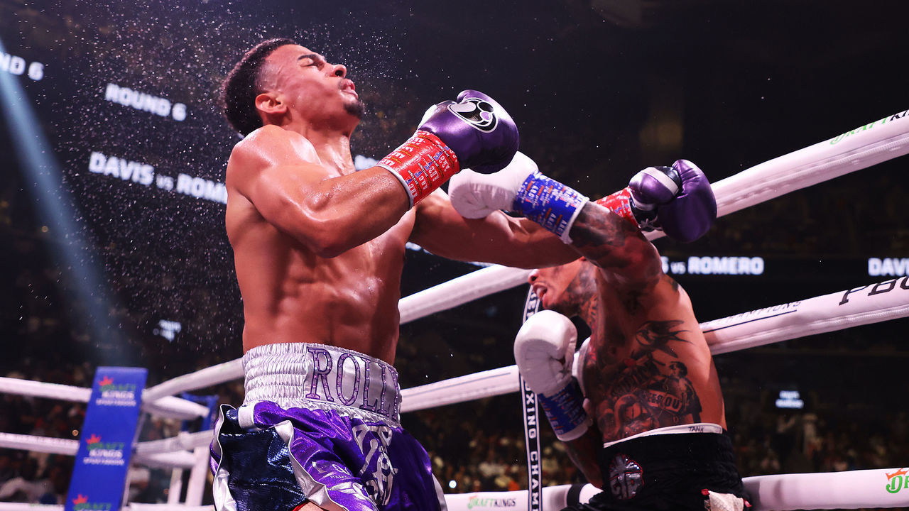 BROOKLYN, NEW YORK - MAY 28: Gervonta Davis knocks out Rolando Romero with a left hook in the sixth round during their fight for Davis' WBA World lightweight title at Barclays Center on May 28, 2022 in Brooklyn, New York.
