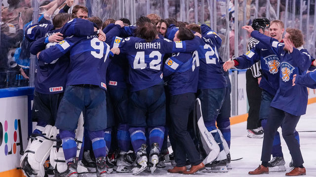 TAMPERE, FINLAND - MAY 29: Members of Team Finland celebrate as winners of the 2022 IIHF Ice Hockey World Championship match between Finland and Canada at Nokia Arena on May 29, 2022 in Tampere, Finland.