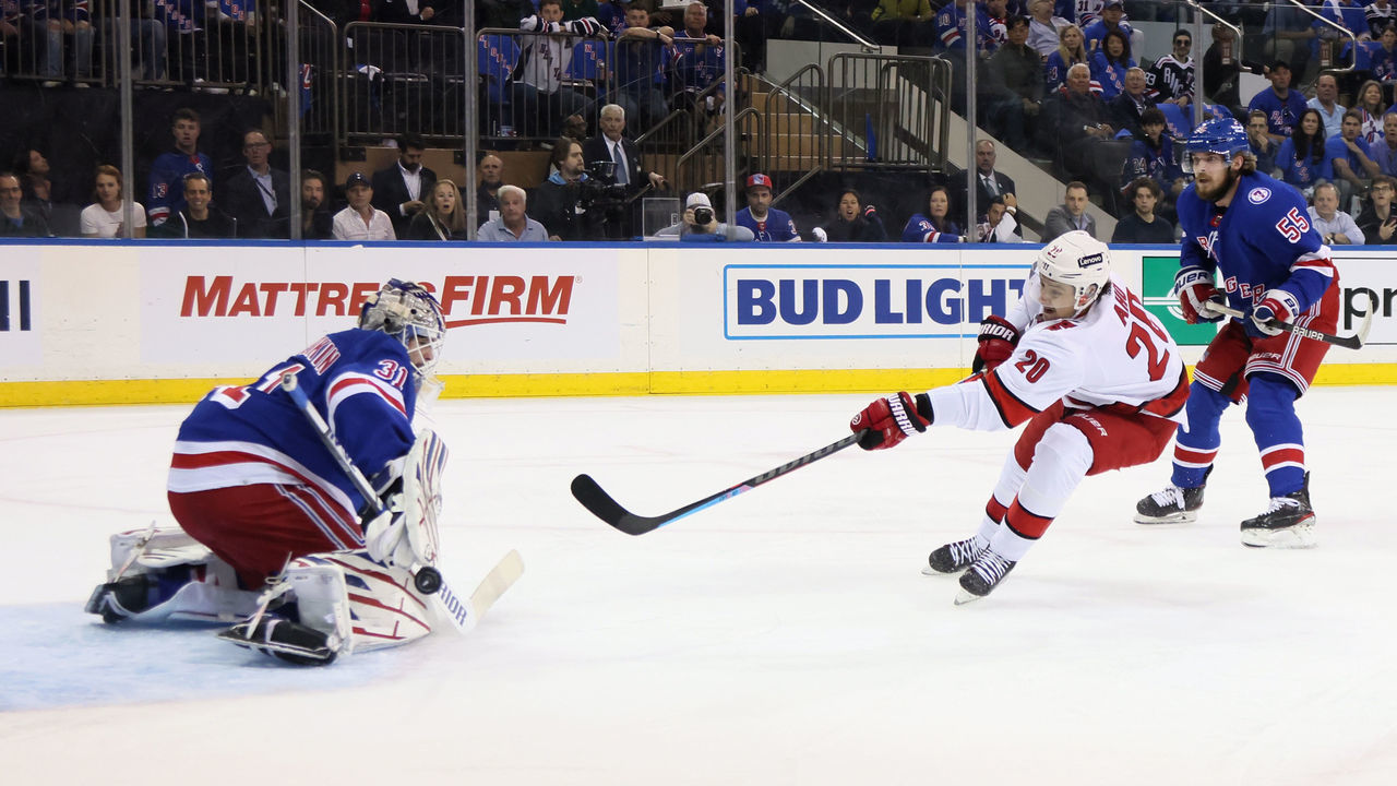 NEW YORK, NEW YORK - MAY 28: Igor Shesterkin #31 of the New York Rangers makes the first period save on Sebastian Aho #20 of the Carolina Hurricanes in Game Six of the Second Round of the 2022 Stanley Cup Playoffs at Madison Square Garden on May 28, 2022 in New York City.