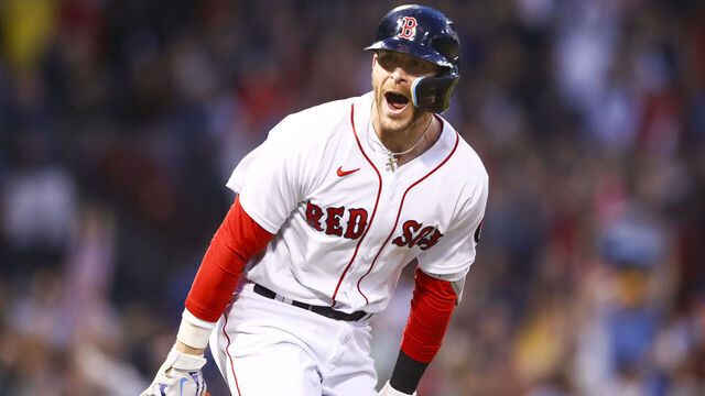 BOSTON, MA - MAY 20: Trevor Story #10 of the Boston Red Sox reacts after hitting a grand slam in the third inning of a game against the Seattle Mariners at Fenway Park on May 20, 2022 in Boston, Massachusetts.