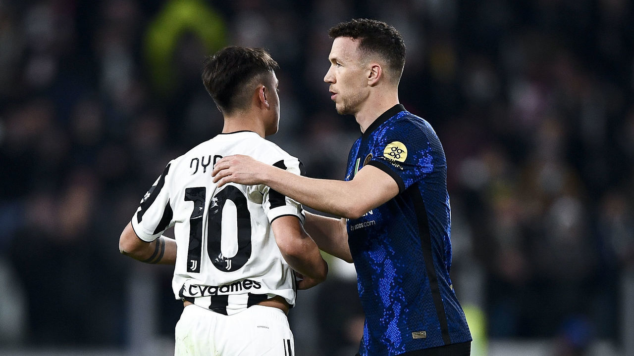 ALLIANZ STADIUM, TURIN, ITALY - 2022/04/03: Paulo Dybala (L) of Juventus FC shakes hands with Ivan Perisic of FC Internazionale at the end of the Serie A football match between Juventus FC and FC Internazionale. FC Internazionale won 1-0 over Juventus FC.