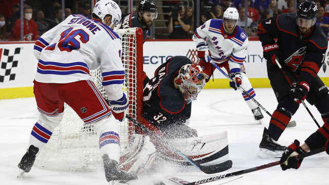 RALEIGH, NORTH CAROLINA - MAY 30: Antti Raanta #32 of the Carolina Hurricanes makes a first period save against Ryan Strome #16 of the New York Rangers in Game Seven of the Second Round of the 2022 Stanley Cup Playoffs at PNC Arena on May 30, 2022 in Raleigh, North Carolina.