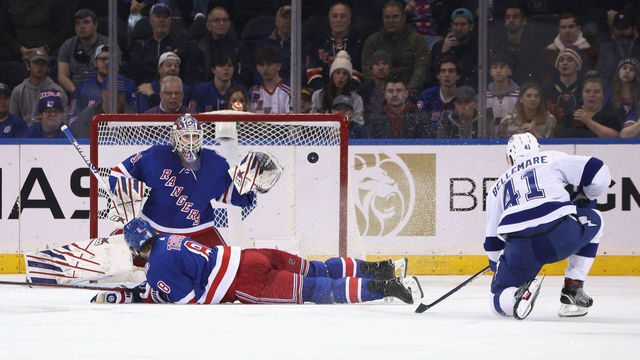 NEW YORK, NEW YORK - JANUARY 02: Igor Shesterkin #31 of the New York Rangers makes the second period save on Pierre-Edouard Bellemare #41 of the Tampa Bay Lightning at Madison Square Garden on January 02, 2022 in New York City.