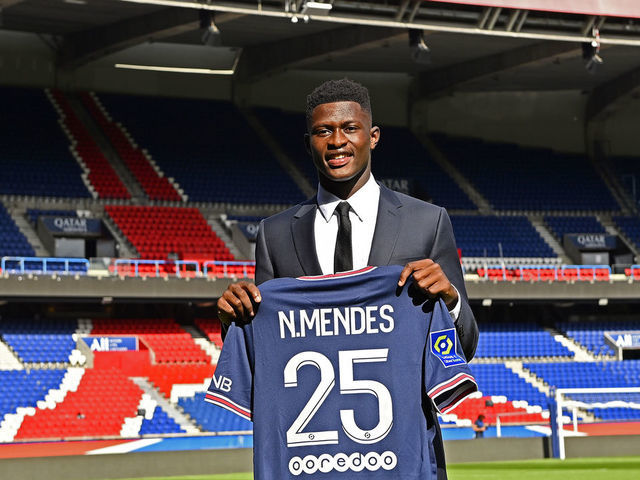 PARIS, FRANCE - SEPTEMBER 09: Nuno Mendes poses with his new jersey inside Parc des Princes on September 09, 2021 in Paris, France.
