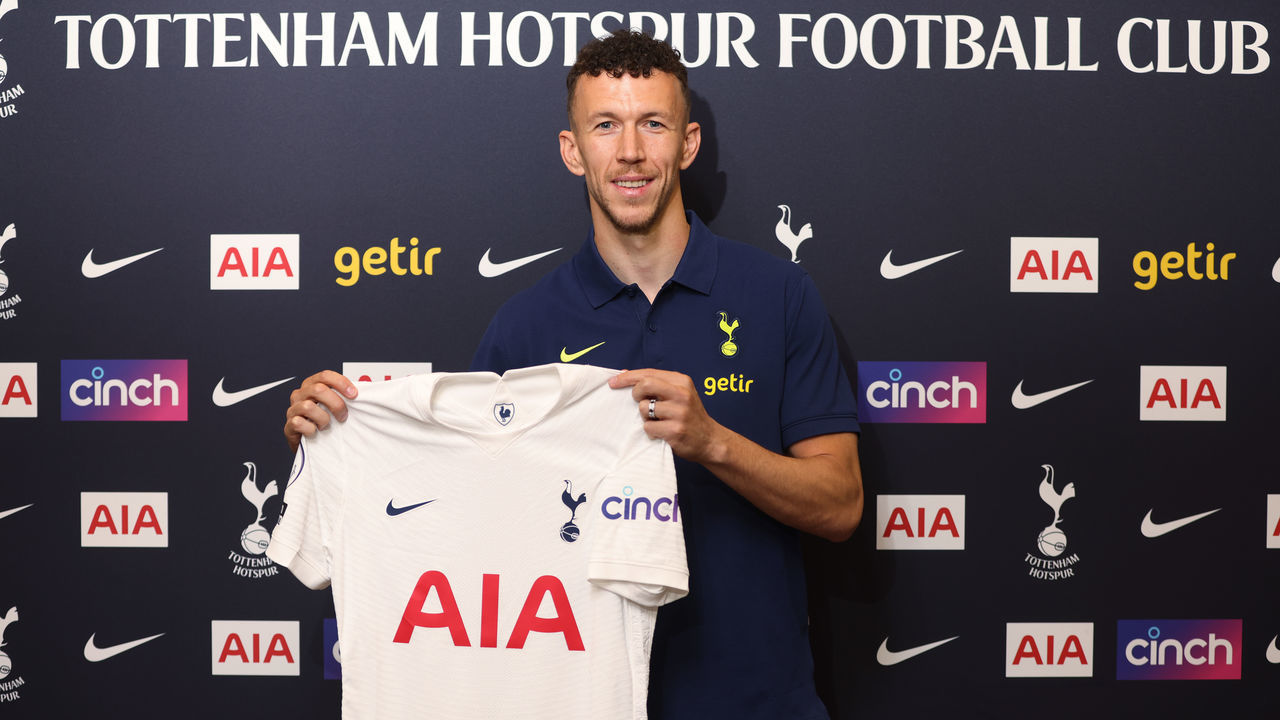 ENFIELD, ENGLAND - MAY 31: New signing Ivan Perisic poses with the Tottenham Hotspur shirt on May 31, 2022 in Enfield, England.