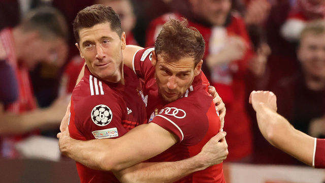 MUNICH, GERMANY - APRIL 12: Robert Lewandowski of FC Bayern Muenchen jubilation with Leon Goretzka of FC Bayern Muenchen during the UEFA Champions League Quarter Final Leg Two match between Bayern München and Villarreal CF at Football Arena Munich on April 12, 2022 in Munich, Germany.