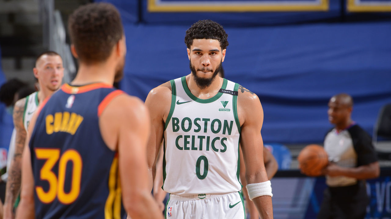 SAN FRANCISCO, CA - FEBRUARY 2: Stephen Curry #30 of the Golden State Warriors and Jayson Tatum #0 of the Boston Celtics look on during the game on February 2, 2021 at Chase Center in San Francisco, California. NOTE TO USER: User expressly acknowledges and agrees that, by downloading and or using this photograph, user is consenting to the terms and conditions of Getty Images License Agreement. Mandatory Copyright Notice: Copyright 2021 NBAE