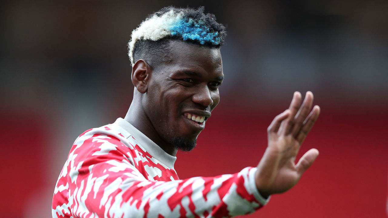 MANCHESTER, ENGLAND - AUGUST 07: Paul Pogba of Manchester United waves at the crowd during the pre-season friendly match between Manchester United and Everton at Old Trafford on August 07, 2021 in Manchester, England.